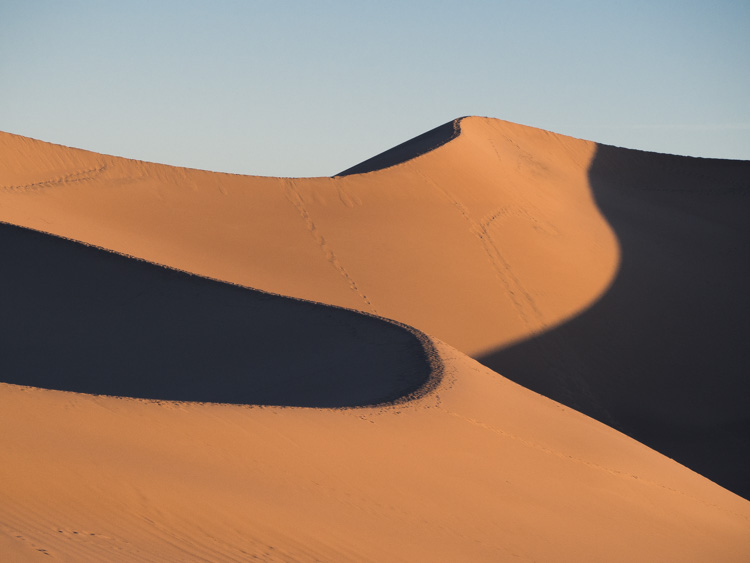 Death Valley Mesquite Dunes at sunrise. sand dunes in shadow