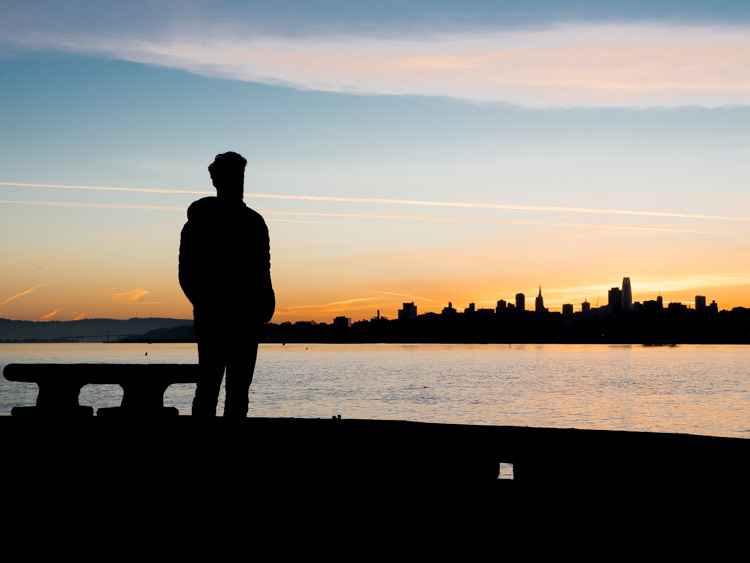 San Francisco Torpedo Wharf at dawn- skyline and man