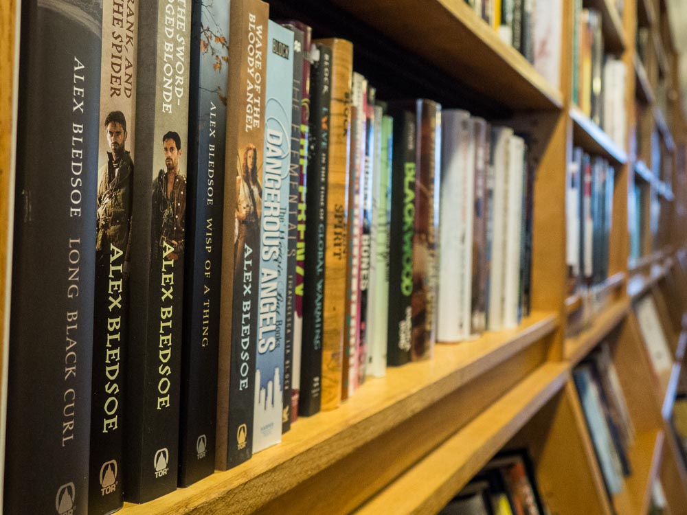 Borderlands Books SF Mission. Shelf of fantasy books.