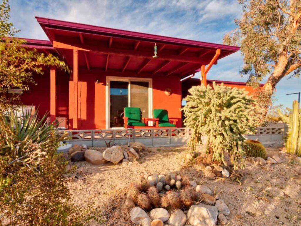 Chucks Cabin in Joshua Tree. red house in desert