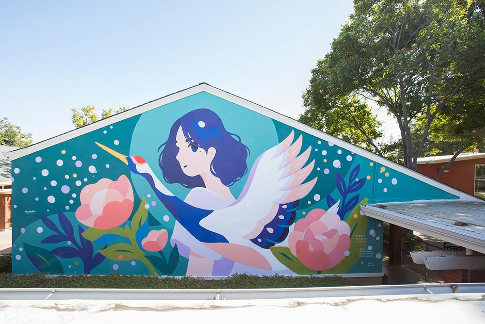 San Jose California mural by Alice Lee. blue woman and dove