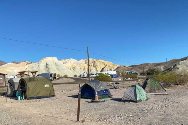 Best death valley camping - Furnace Creek campground. tents and mountain background