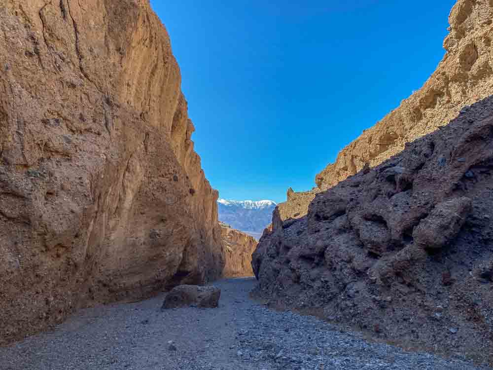 Death Valley Sidewinder Canyon hike. Canyon with shadow and mountains