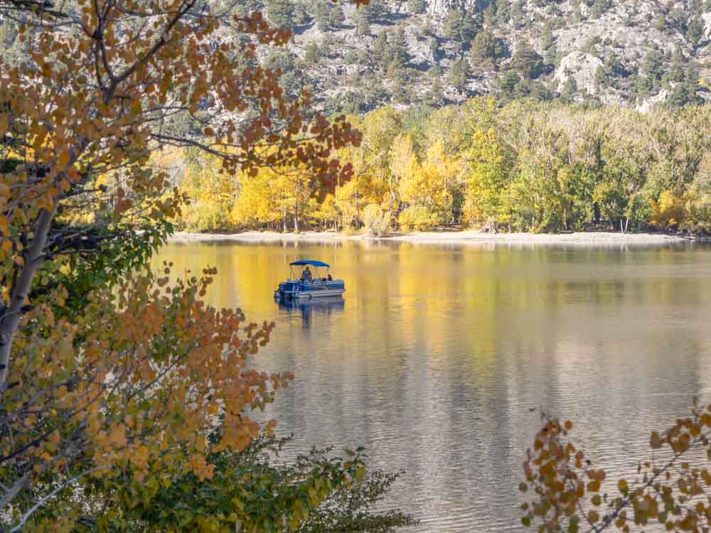 Convict Lake boaters in the fall with turning leaves