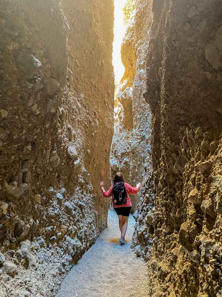 Death Valley Sidewinder Canyon - slot canyon #3. woman hiking