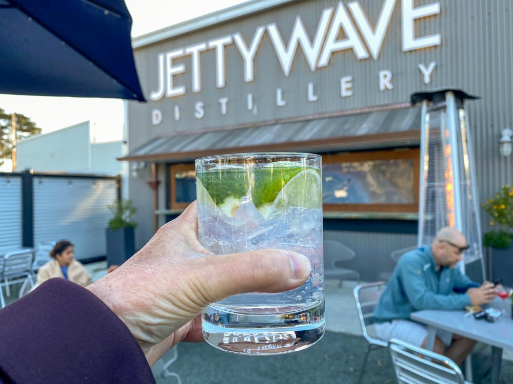 Jettywave distillery in Princeton Harbor. cocktail glass and sign