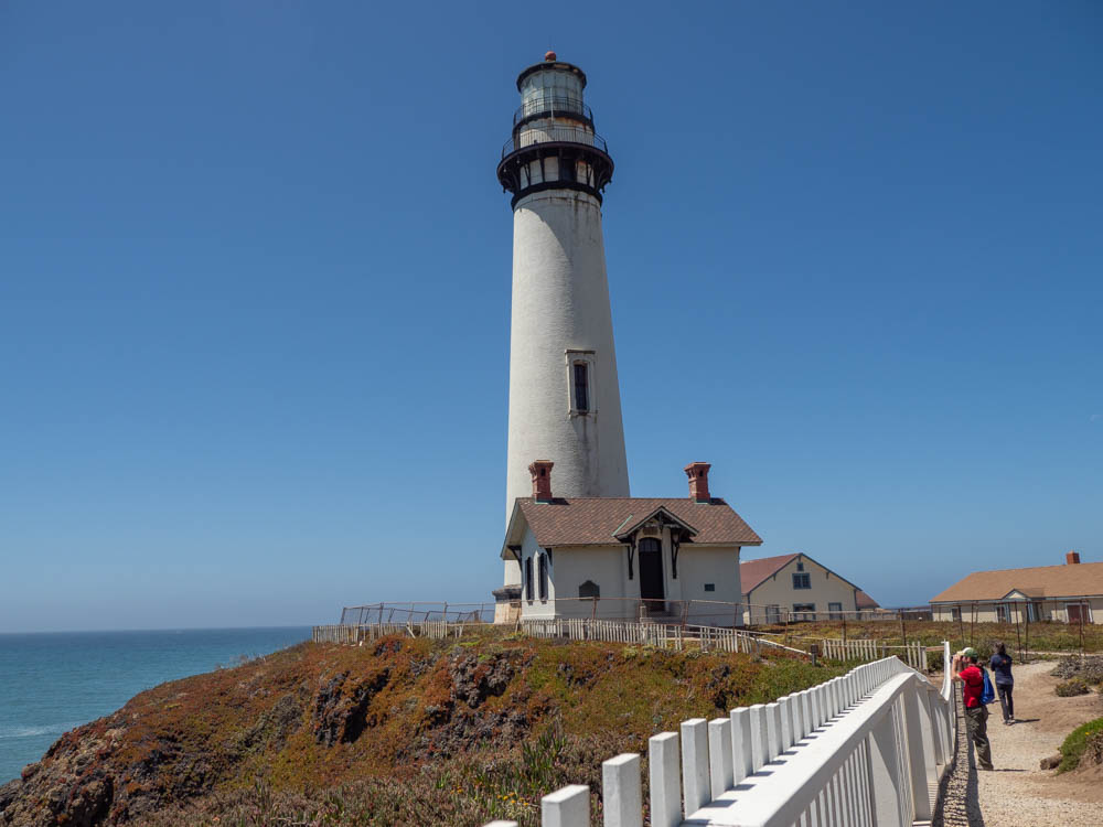 Pidgeon Point Lighthouse in Half Moon Bay. ocean view and white fence