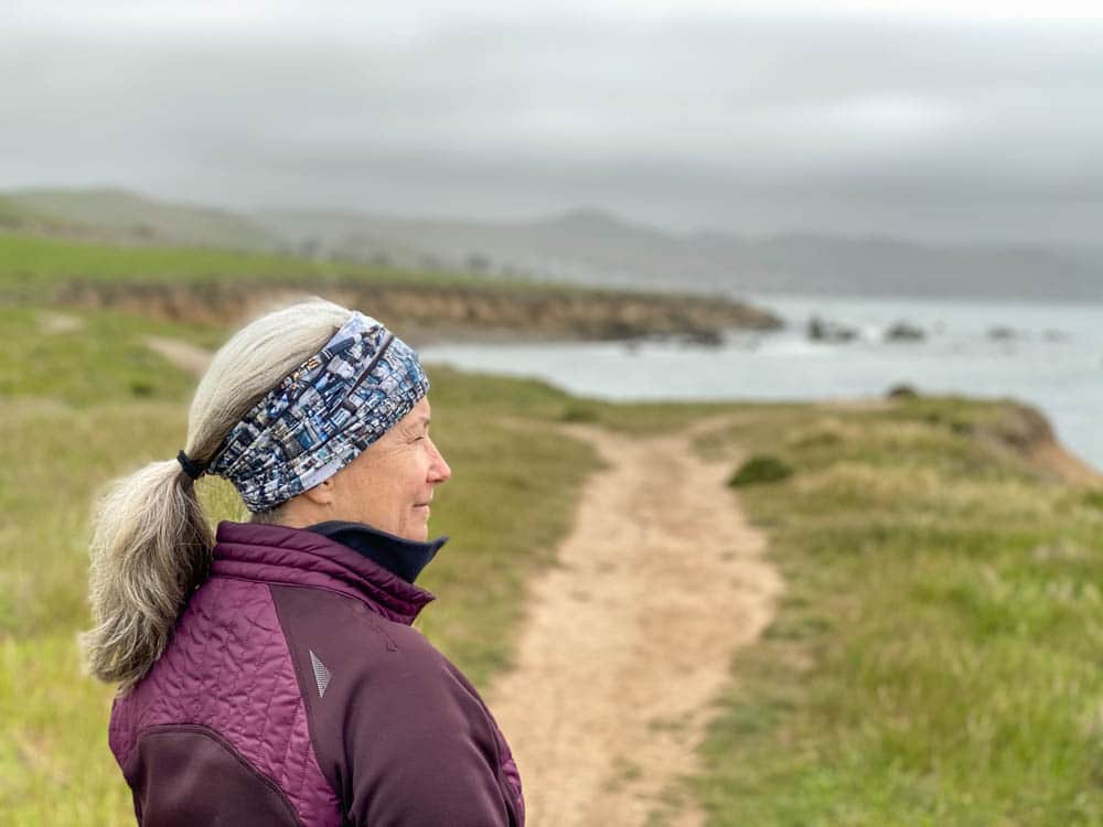 Cayucos Estero Bluffs hike. woman looking at ocean