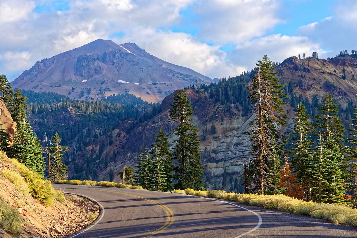 Volcanic Scenic Byway in California: Lassen National Park. highway and mountains