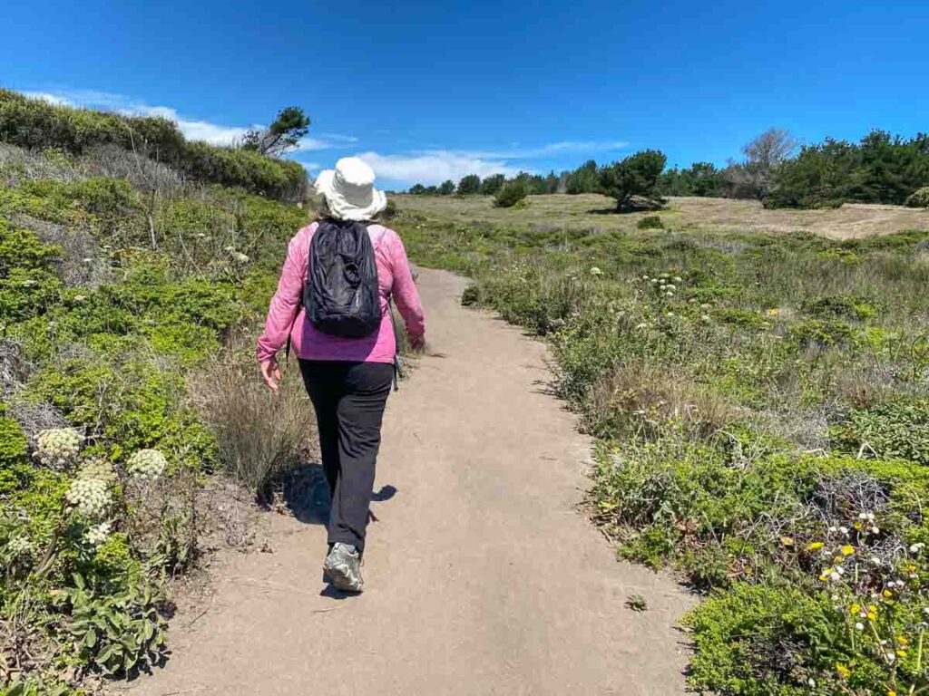 Hiker on Pillar Point Bluff