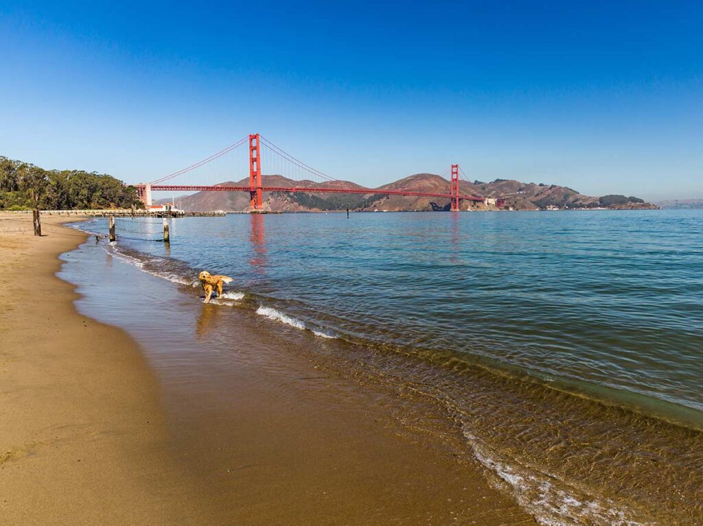 The Presidio's Crissy Field beach with Golden Gate Bridge