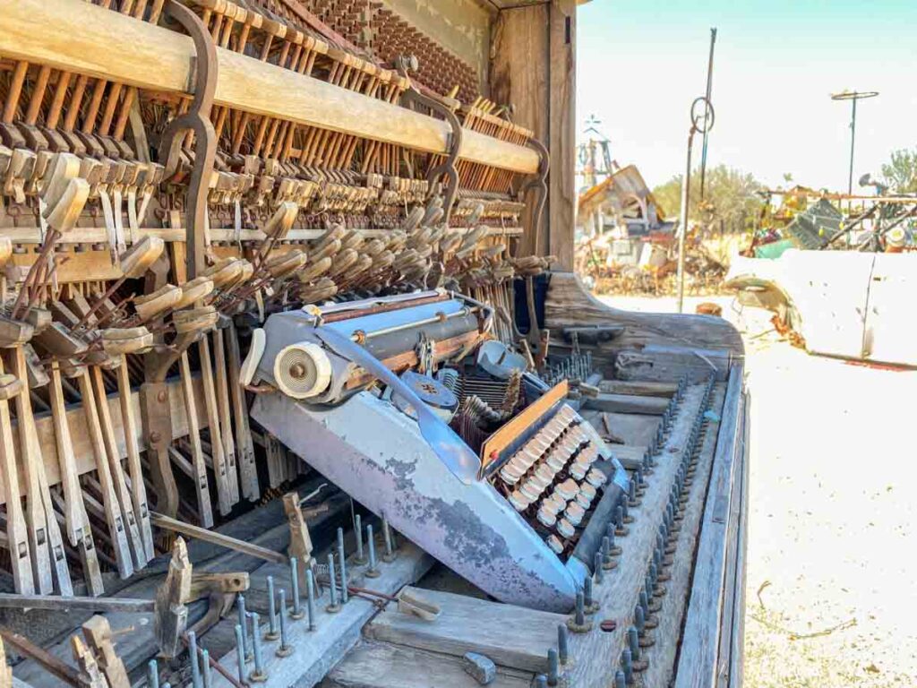 Piano and typewriter sculpture East Jesus