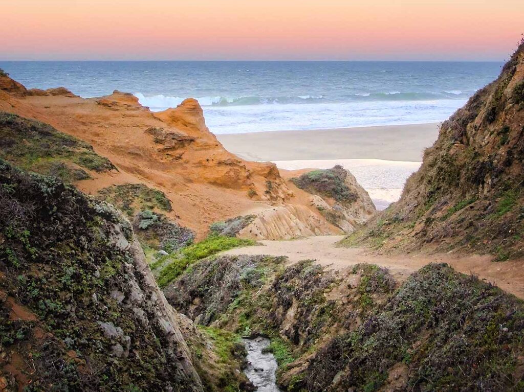 Point Reyes National Seashore, cliff and ocean at sunset.